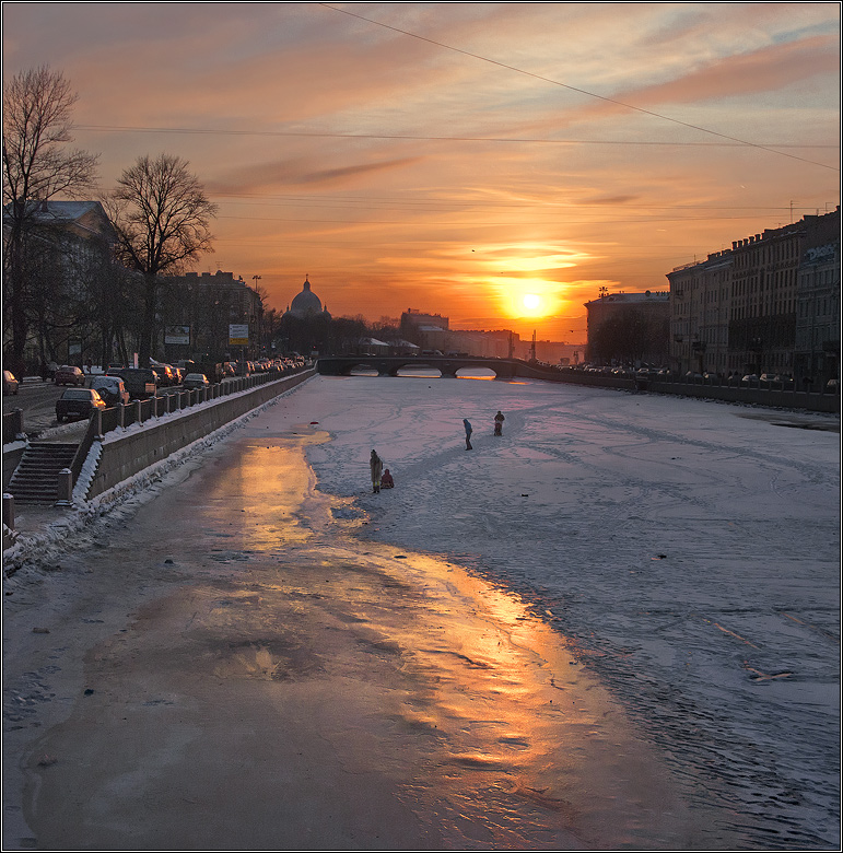 Frosen river and the Sun